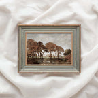Cozy autumn landscape art print featuring muted brown and blue autumn hues.