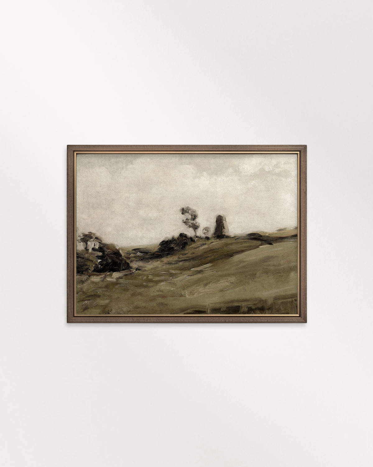 Muted green landscape artwork styled as earthy bedroom wall art