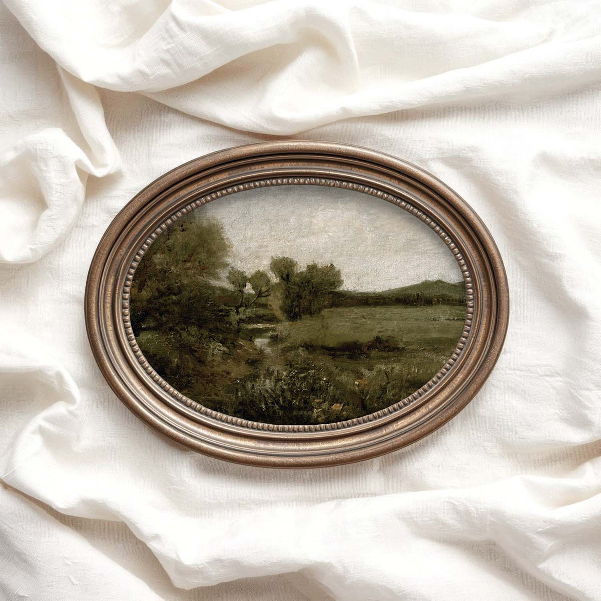 Green landscape wall art featuring a vintage countryside scene in earthy olive and neutral tones