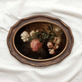 Moody cottage decor autumn rose wall print in a vintage still life art style, warm fall floral mood.