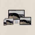 Navy blue desktop wallpaper featuring a minimal abstract coastal landscape in muted blue tones with matching device wallpapers