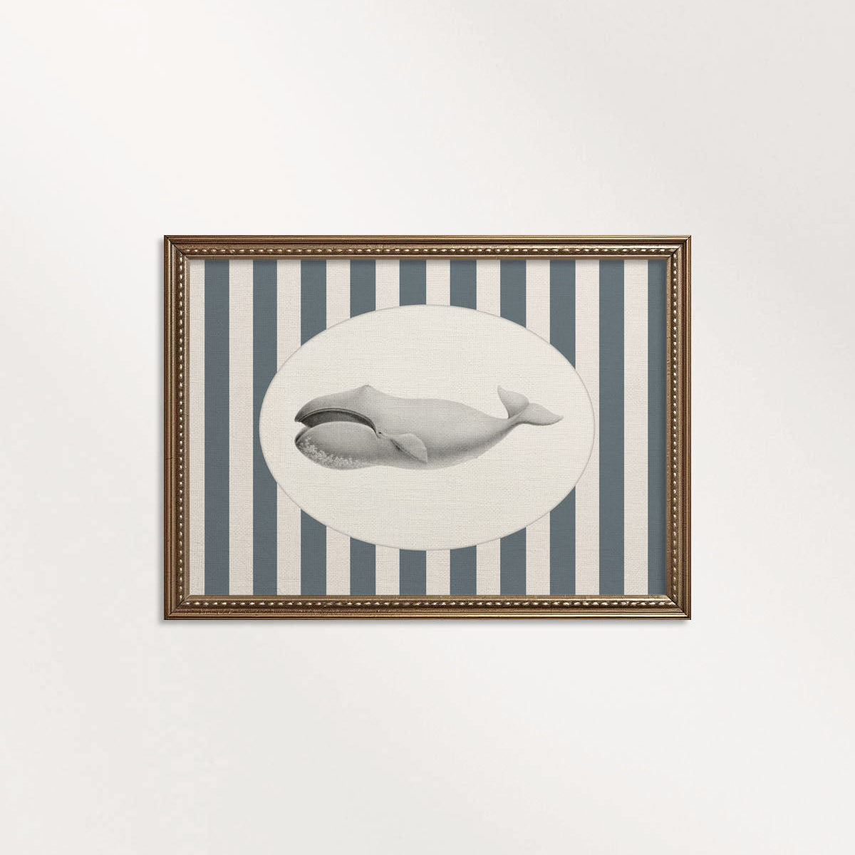Navy whale nursery print featuring a striped storybook whale for ocean nursery wall art