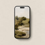 River landscape iPhone wallpaper featuring calm water and hills in olive green and warm neutral tones