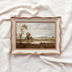 Rustic country and modern rustic wall decor featuring a sepia landscape lake scene.
