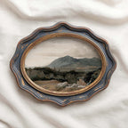 Rustic Western wall art featuring an atmospheric vintage mountain painting
