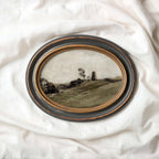 Vintage-style green landscape print in muted olive and neutral tones for living room decor