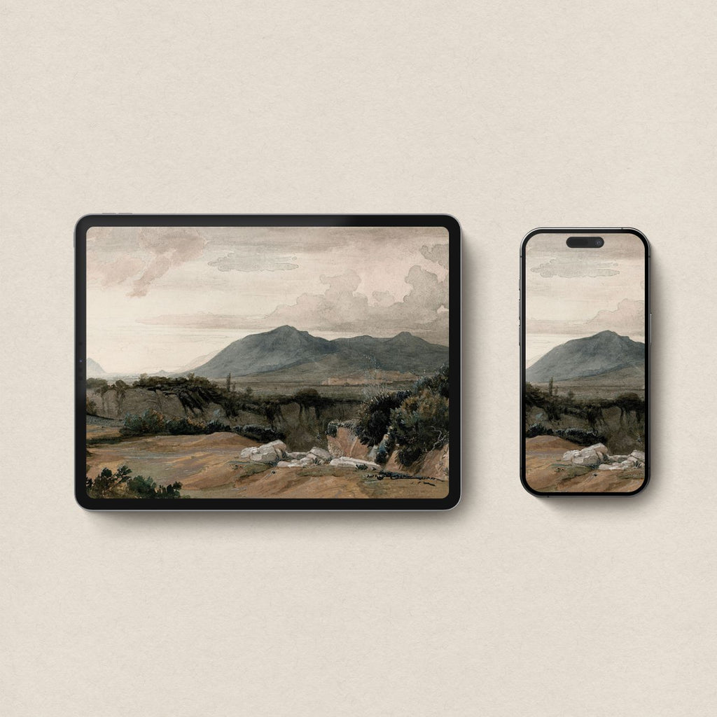 Matching vintage Western mountain wallpapers displayed across iPad and iPhone screens