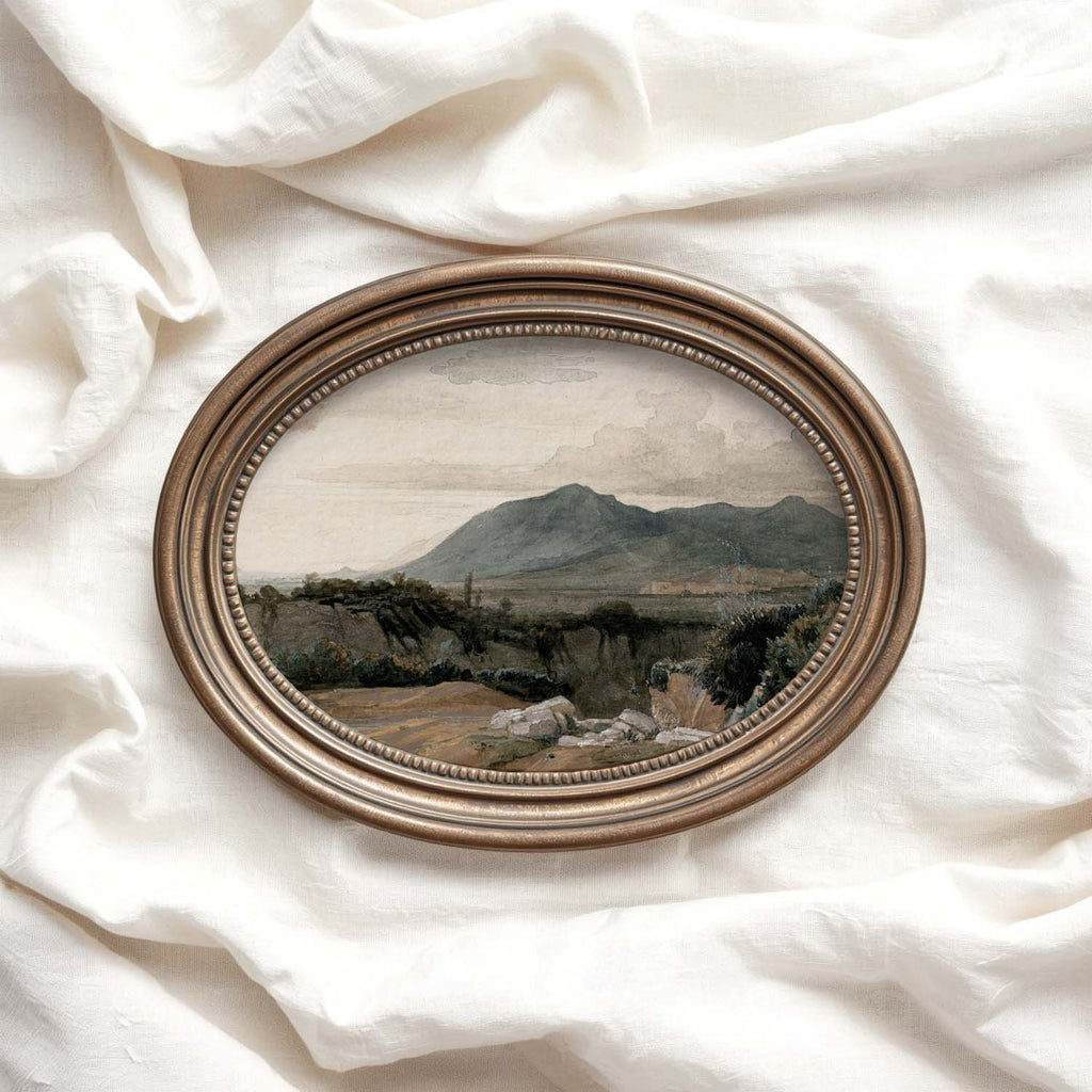 Vintage Western wall art featuring a rugged mountain landscape in muted natural tones