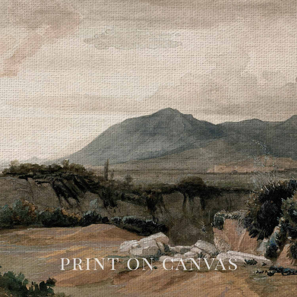 Close-up of vintage Western mountain landscape artwork printed on textured canvas.